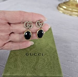 Gucci Black and Gold Oval Earrings